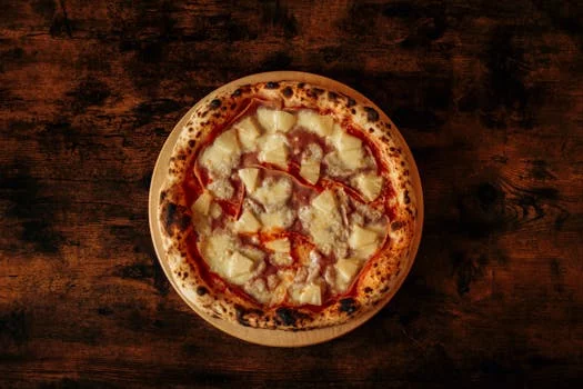 hawaiian pizza with ham pineapple cheese