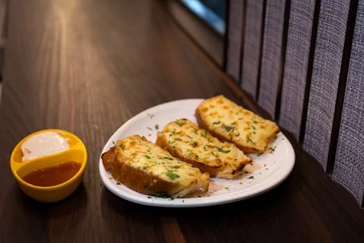 garlic bread with herbs butter melted cheese
