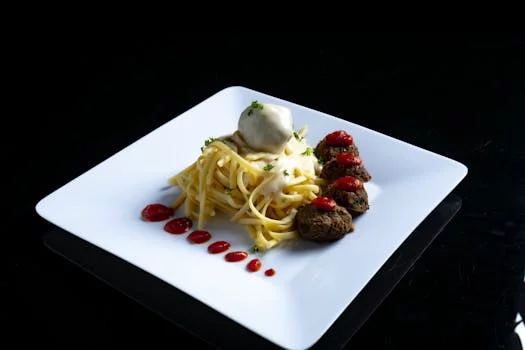 spaghetti meatballs marinara sauce parmesan cheese